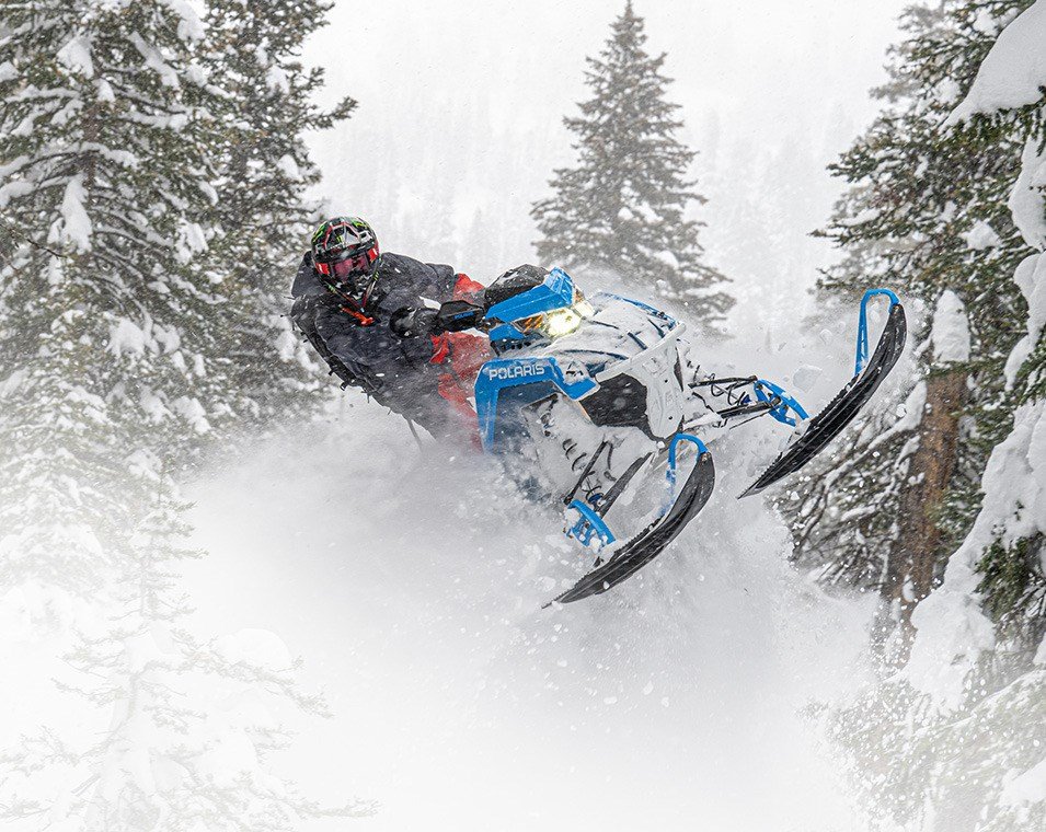RZR 570 going down a green trail road
