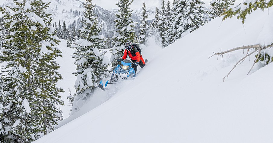 RZR 570 going down a green trail road