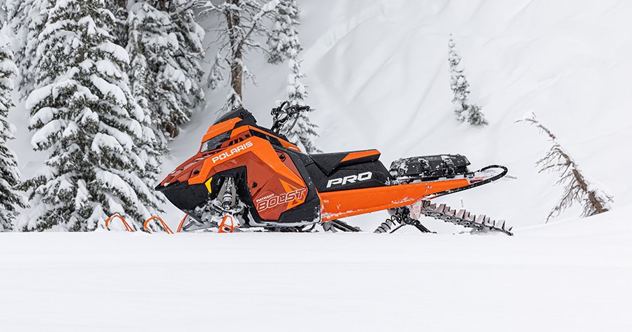 RZR 570 going down a green trail road