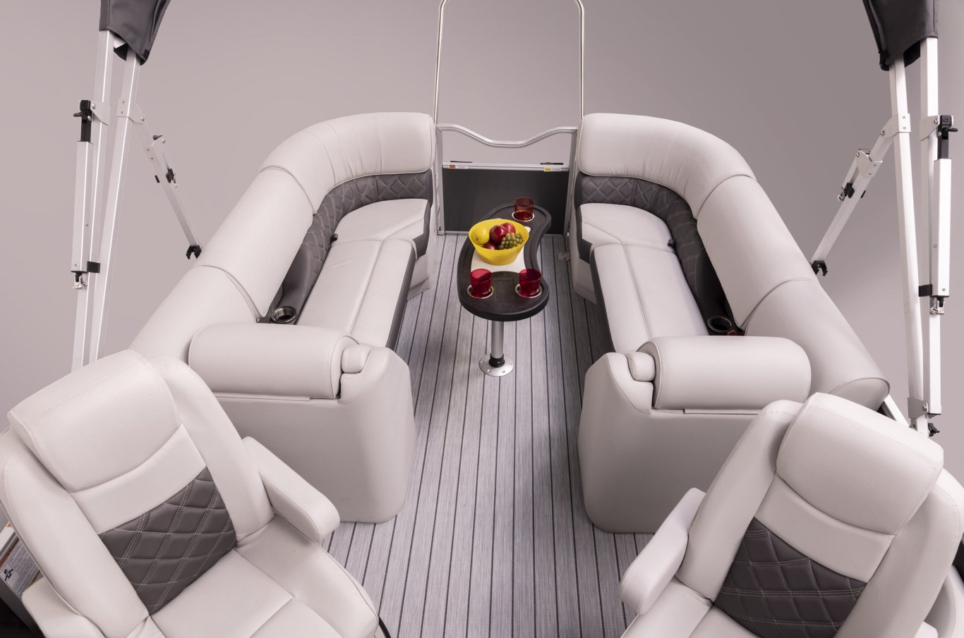 https://www.suncatcherpontoons.com/wp/wp-content/uploads/sites/2/2021/07/Elite-322-C-Lighted-Cup-Holders-in-Couch-Tan-Interior-scaled.jpg