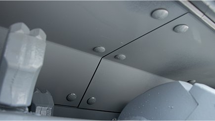 https://baumalight.com/brush-mulchers/img/features/mx948r/Replaceable-bolt-in-wear-plates.jpg