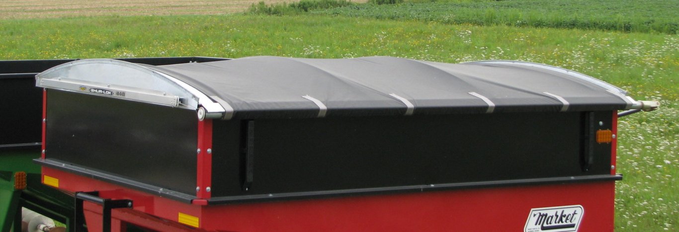 Market roll tarps for gravity boxes
