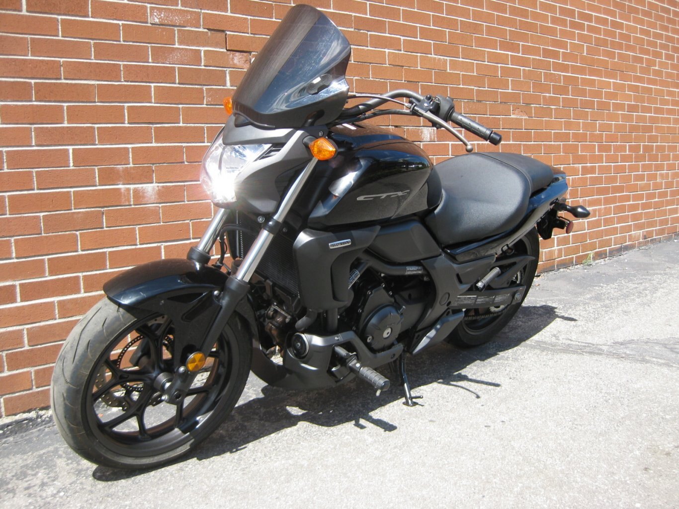 2014 Honda CTX700N SOLD CONGRATULATIONS TO SIR JAMES – A FELLOW “ROAD WARRIOR” !! WELCOME TO THE DARKSIDE & THE COMMUNITY OF MOTORCYCLING ON YOUR DARK HORSE A TWO WHEEL FREEDOM MACHINE” WITH THANKS FROM GARY & TEAM CYCLE WORLD!!!!