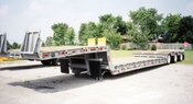 J.C. Folding gooseneck with special rear bridge to load rollers, etc. for paving contractors