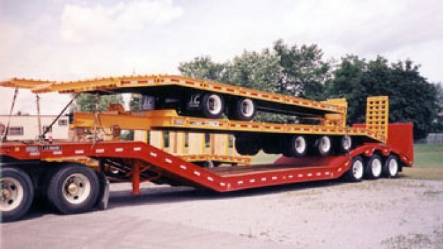 J.C. Special curved beavertail trailer designed for high mast fork lift trucks