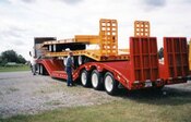 J.C. Special curved beavertail trailer designed for high mast fork lift trucks