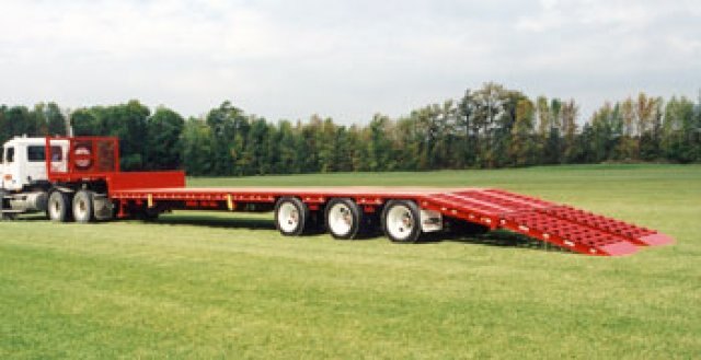 J.C. Specially designed single drop trailer c/w beavertail, liftable centre ramps on beavertail to load pallets, etc., air ramps