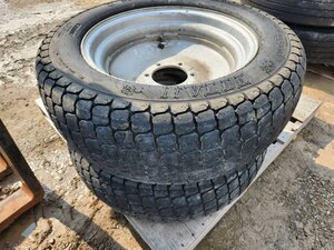 Titan LSW305-521 R3 turf tires on rims