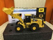 1-50 CAT 980M WHEELER LOADER with OPERATOR and METAL COLLECTERS BOX