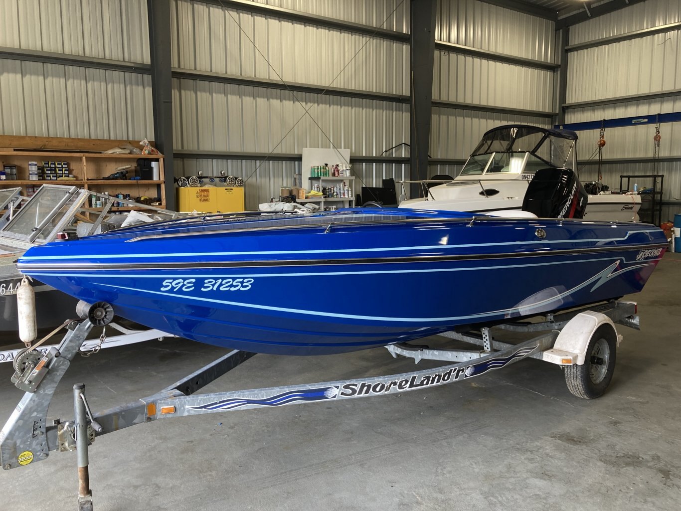 Checkmate Pulse 170 w/200hp Merc OB and Trailer
