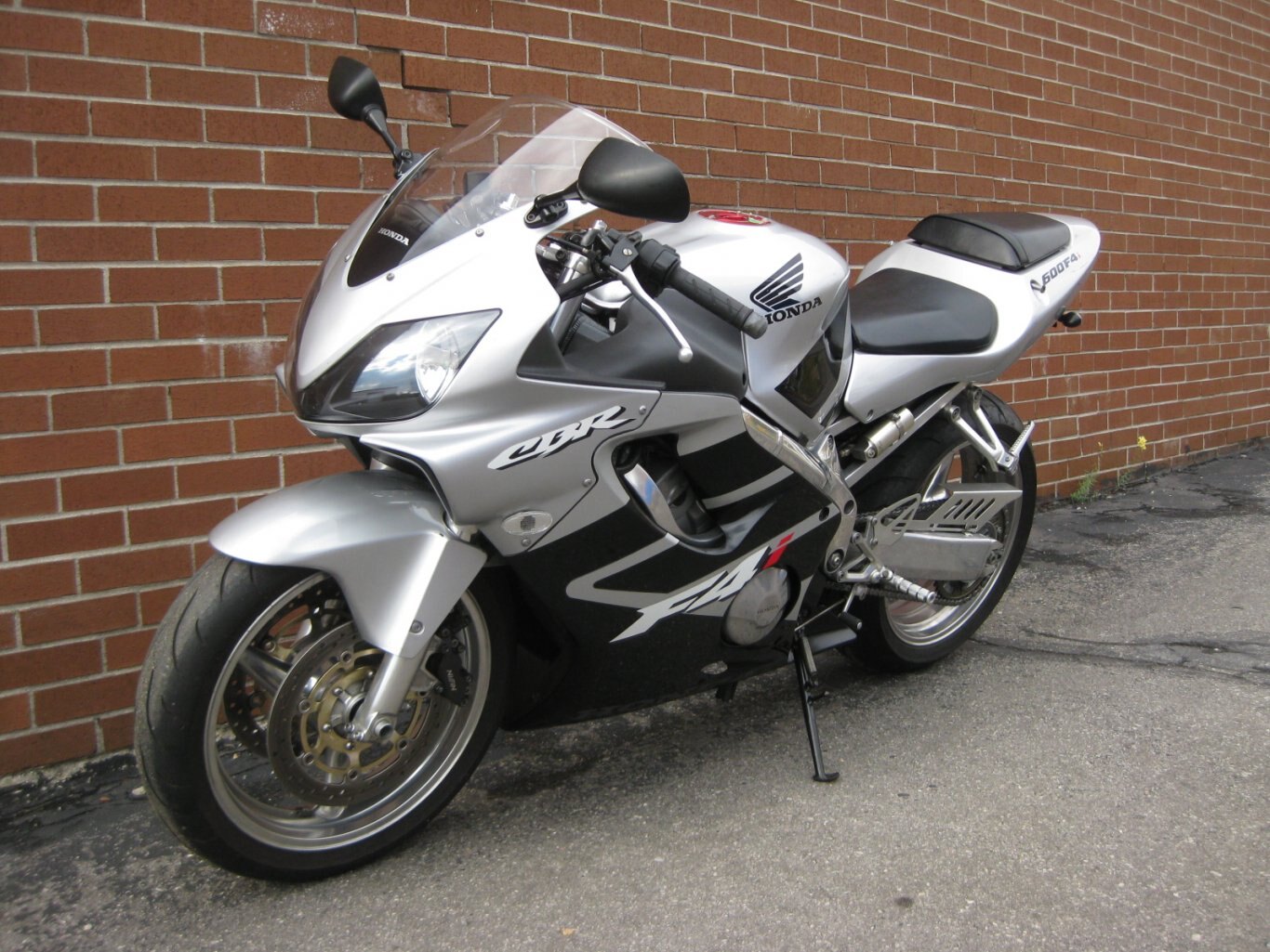 2001 Honda CBR600F4i SOLD CONGRATULATIONS TO RONEIL !! WELCOME TO THE COMMUNITY OF MOTORCYCLING ON THIS SUPERSPORT STYLE HONDA F4i TWO WHEEL FREEDOM MACHINE !!! WHETHER CUTIN THROUGH CITY STREETS OR CARVIN THROUGH THE CANYONS YOU WILL HAVE SMILES FOR MANY MILES WITH THANKS FROM GARY & TEAM CYCLE WORLD!!!!