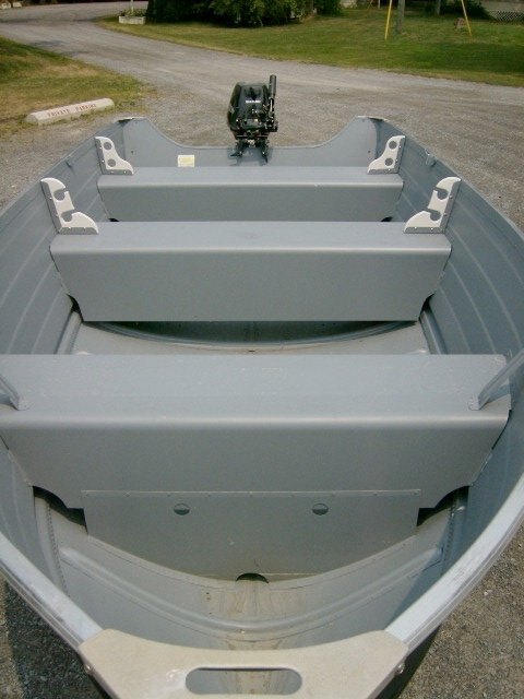 14 ft Utility Boat with bench seats and 9.9 hp outboard motor